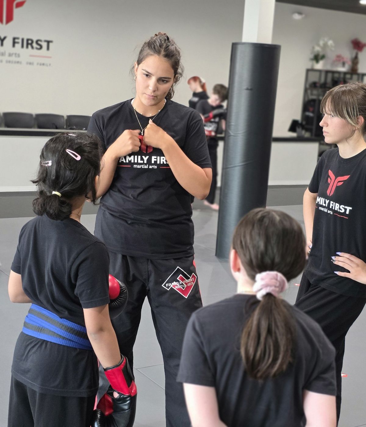 Coach teaching a class at Family First Franklin