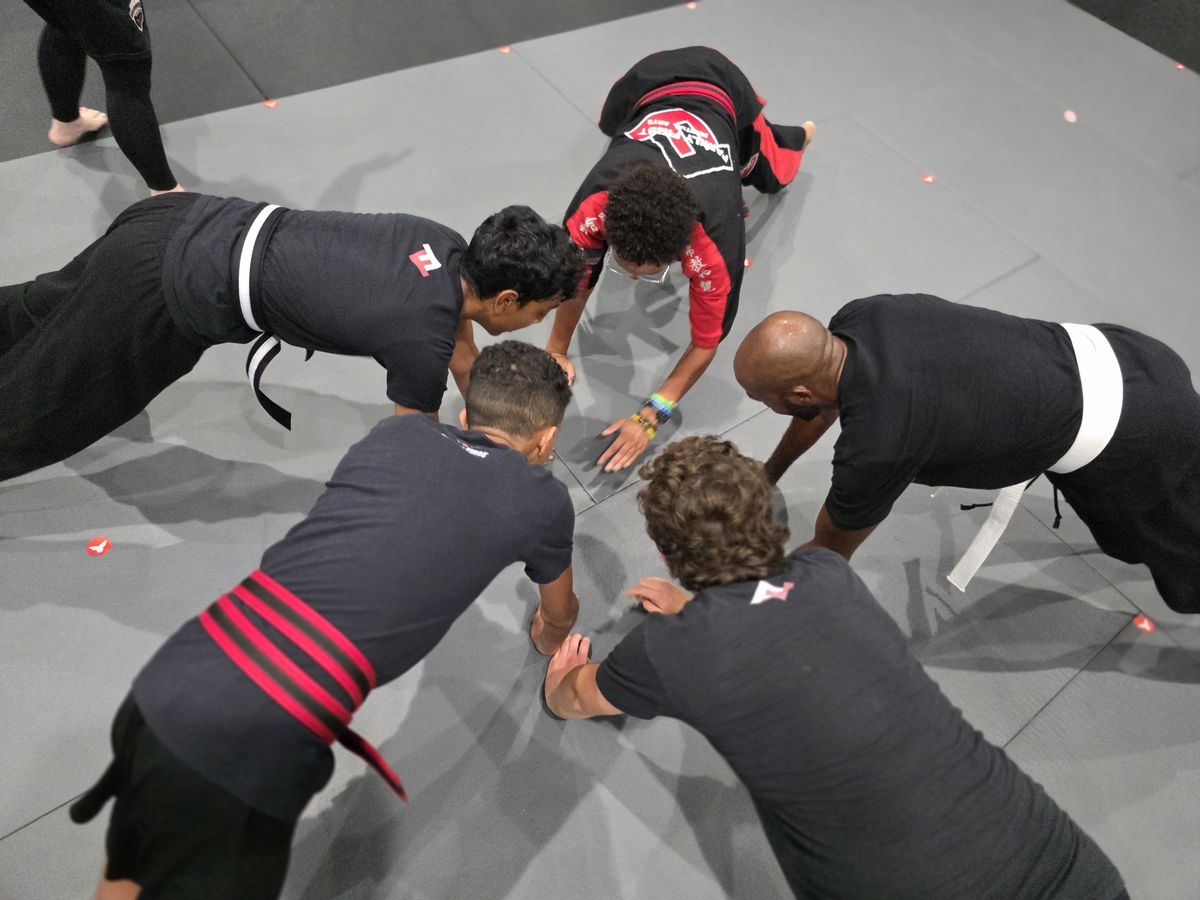 Team push ups at the end of class