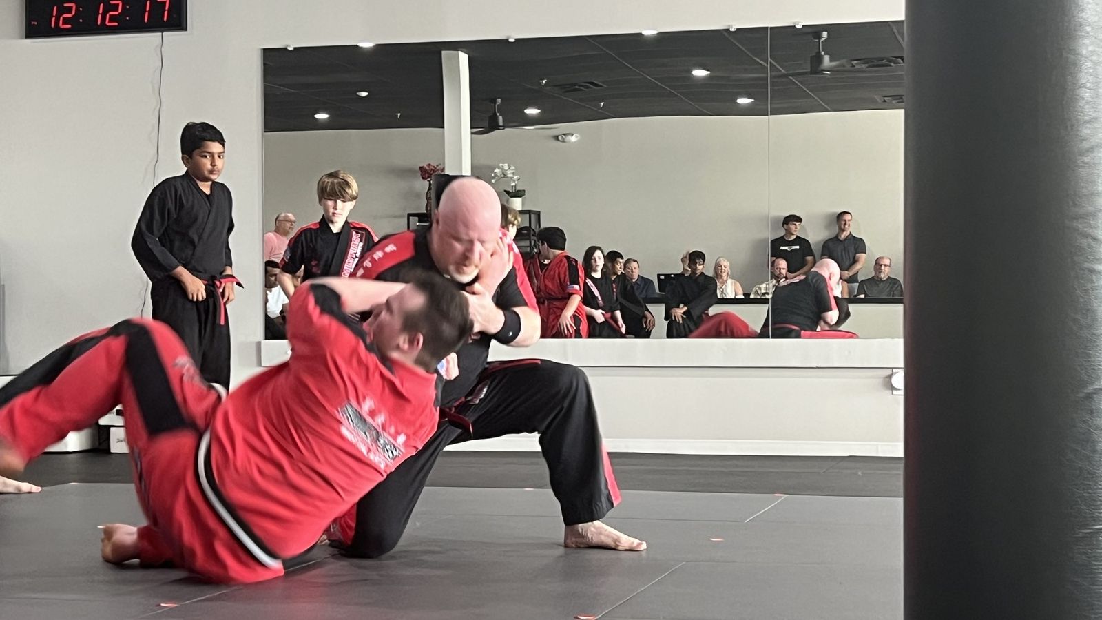Belt testing in front of families